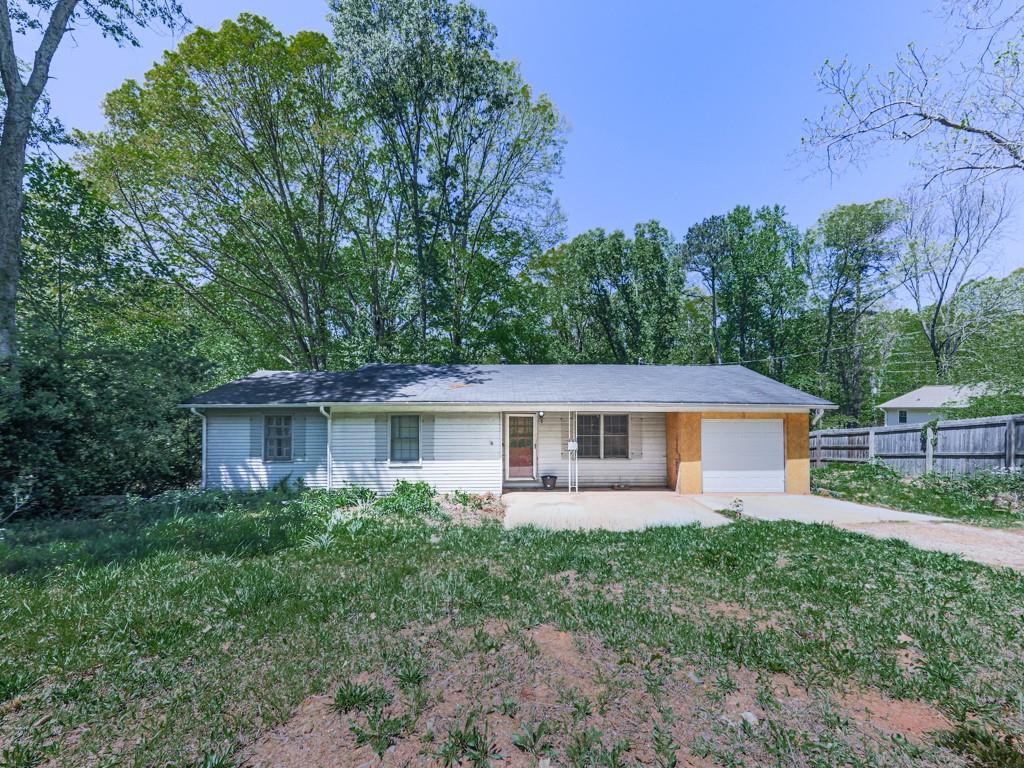 a house view with a garden space