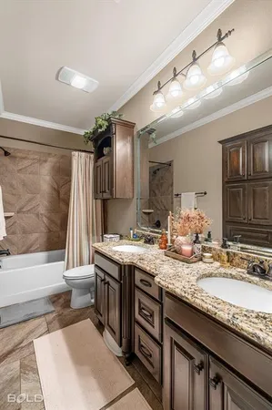 a bathroom with a granite countertop sink a mirror and a bathtub