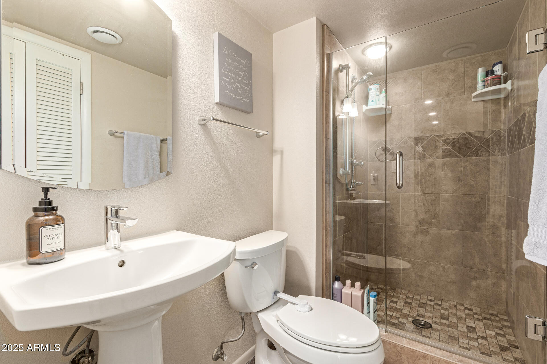 8135 North Central Avenue, Unit 7 Phoenix, AZ 85020 - Photo 14 of 25 a bathroom with a sink toilet and shower