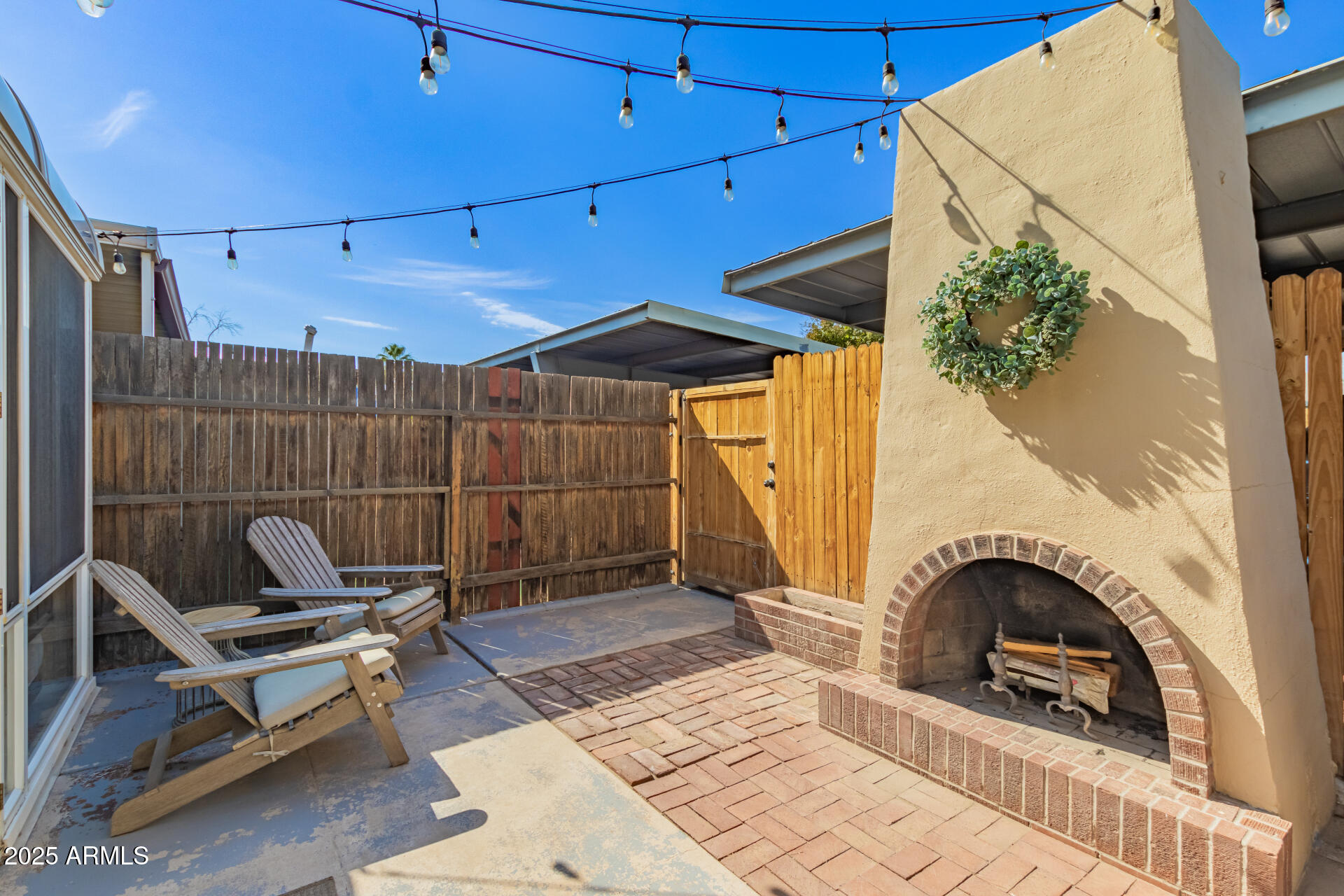 8135 North Central Avenue, Unit 7 Phoenix, AZ 85020 - Photo 22 of 25 a patio with table and chairs