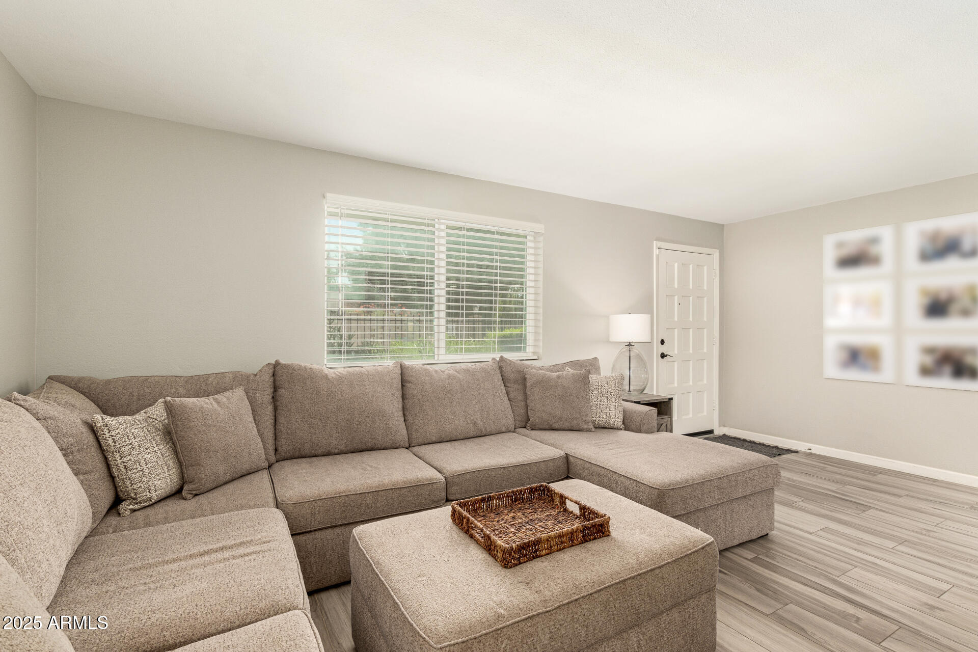 8135 North Central Avenue, Unit 7 Phoenix, AZ 85020 - Photo 4 of 25 a living room with furniture and a window