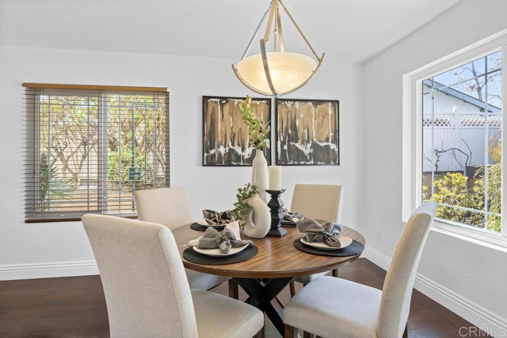 978 Roca Place Chula Vista, CA 91910 - Photo 12 of 45 a view of a dining room with furniture window and wooden floor