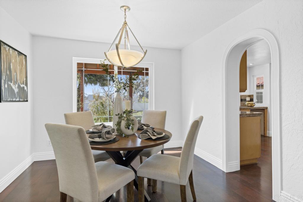 978 Roca Place Chula Vista, CA 91910 - Photo 13 of 45 a view of a dining room with furniture window and wooden floor