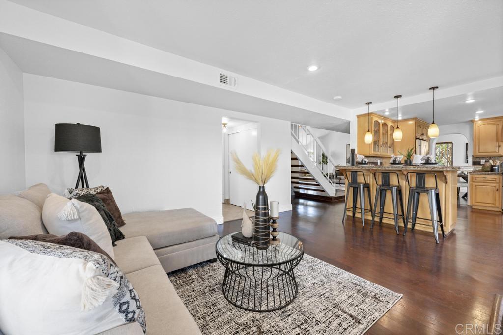 978 Roca Place Chula Vista, CA 91910 - Photo 19 of 45 a living room with furniture and wooden floor