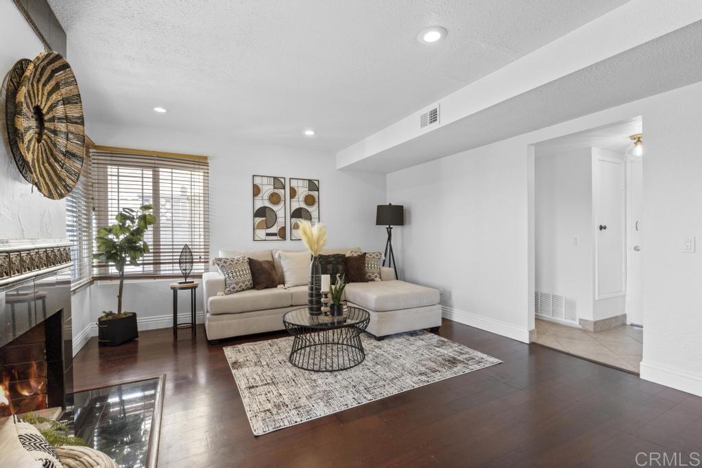 978 Roca Place Chula Vista, CA 91910 - Photo 20 of 45 a living room with furniture and a wooden floor