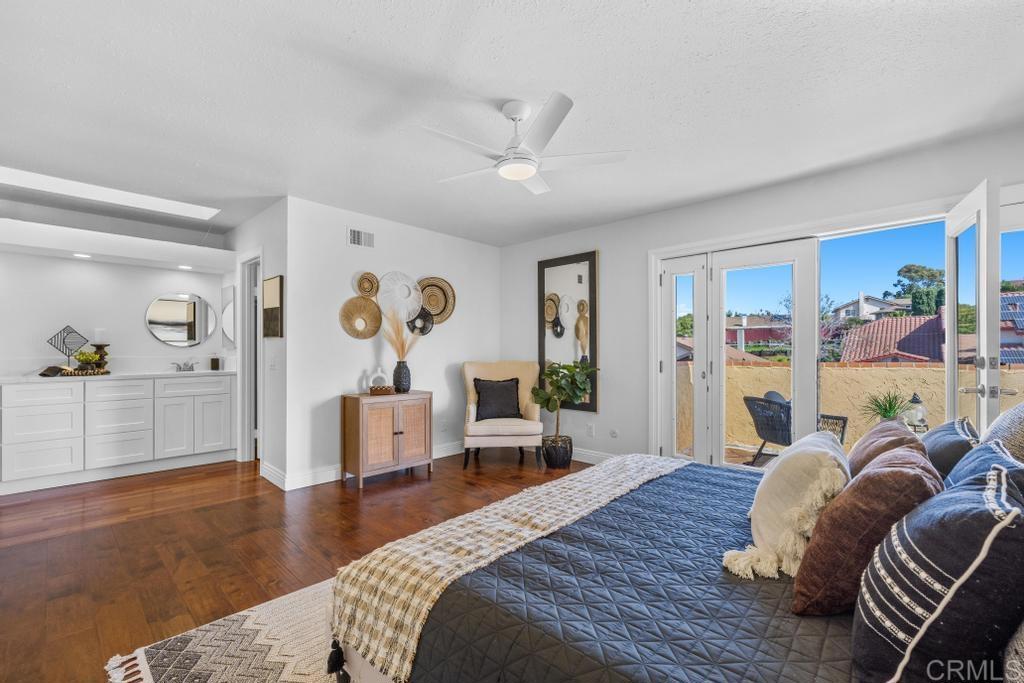978 Roca Place Chula Vista, CA 91910 - Photo 25 of 45 a bedroom with furniture and a wooden floor