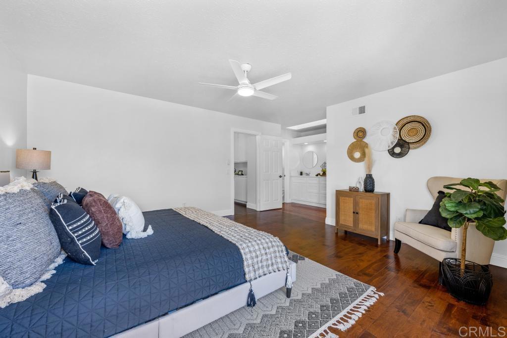 978 Roca Place Chula Vista, CA 91910 - Photo 27 of 45 a bedroom with a bed and a chandelier