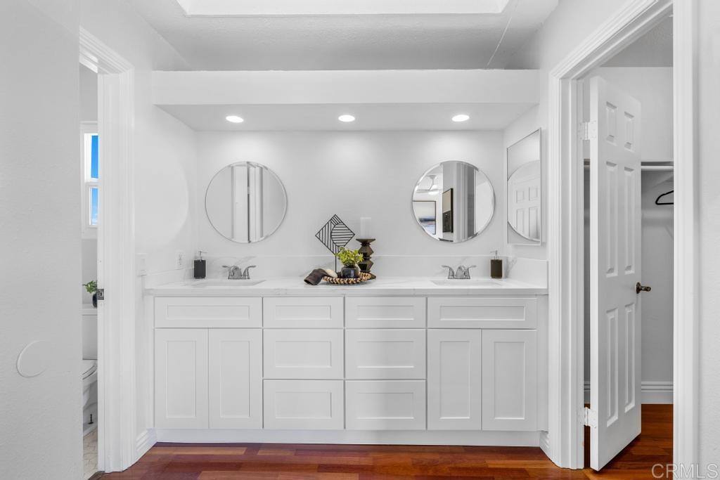 978 Roca Place Chula Vista, CA 91910 - Photo 28 of 45 a bathroom with a sink and a mirror
