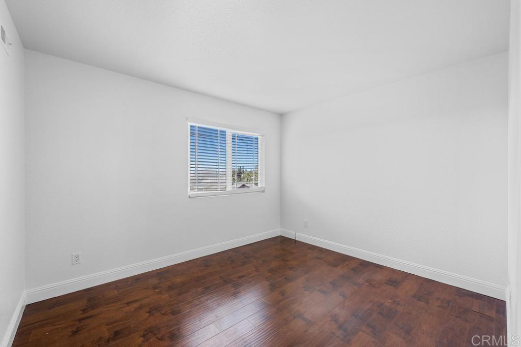 978 Roca Place Chula Vista, CA 91910 - Photo 31 of 45 wooden floor in an empty room