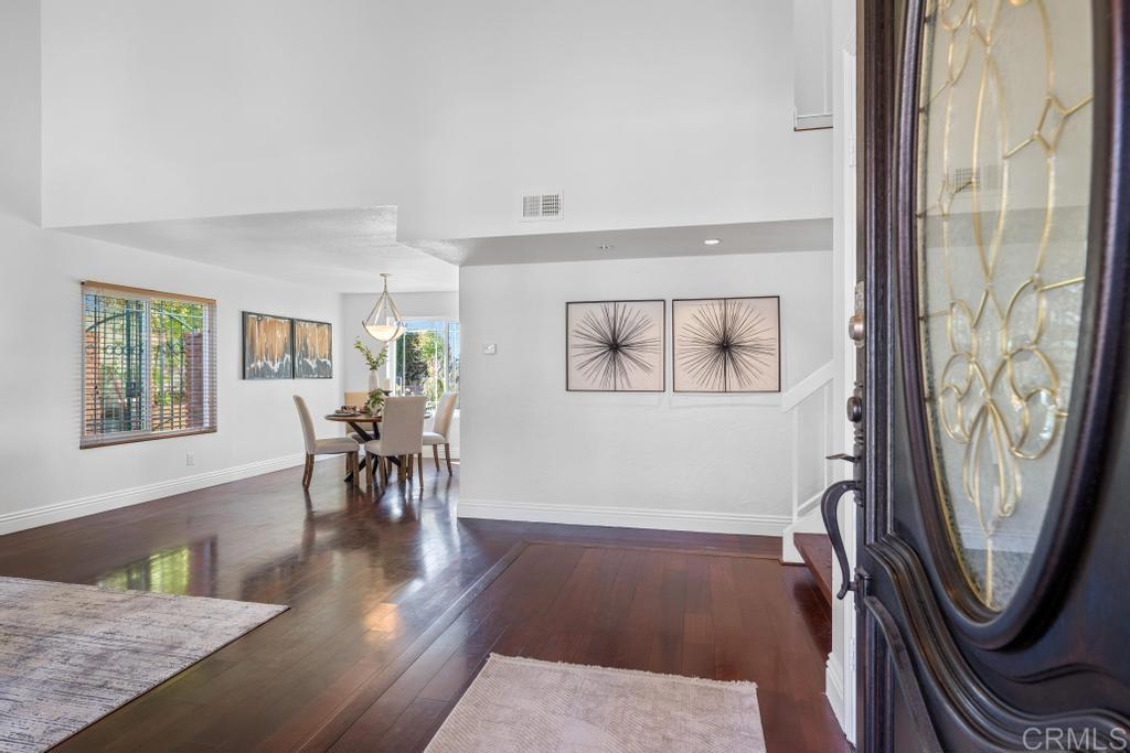 978 Roca Place Chula Vista, CA 91910 - Photo 6 of 45 a view of a livingroom with furniture and wooden floor