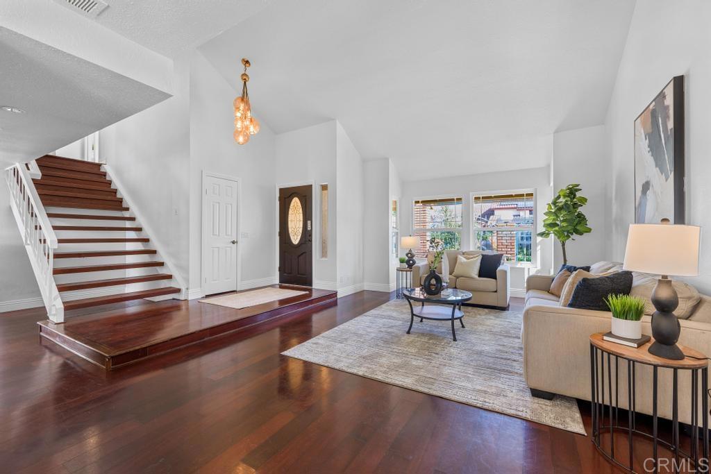 978 Roca Place Chula Vista, CA 91910 - Photo 9 of 45 a living room with furniture and a wooden floor