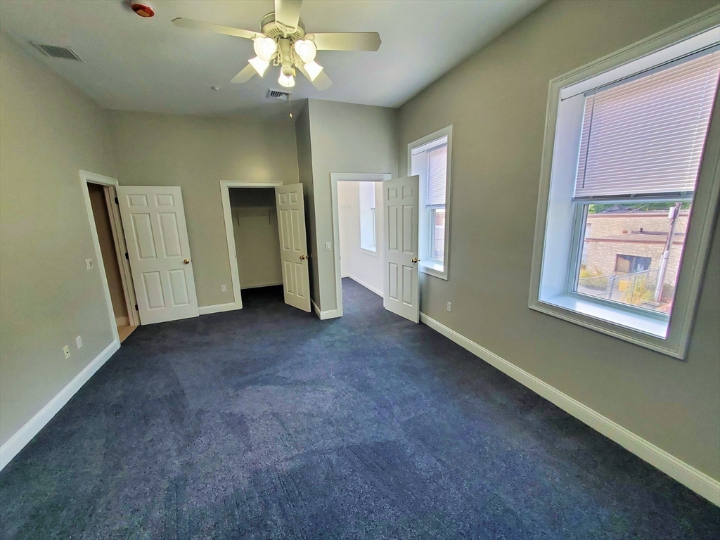37 Central Square, Unit 37B Bridgewater, MA 02324 - Photo 4 of 15 a view of an empty room with a window