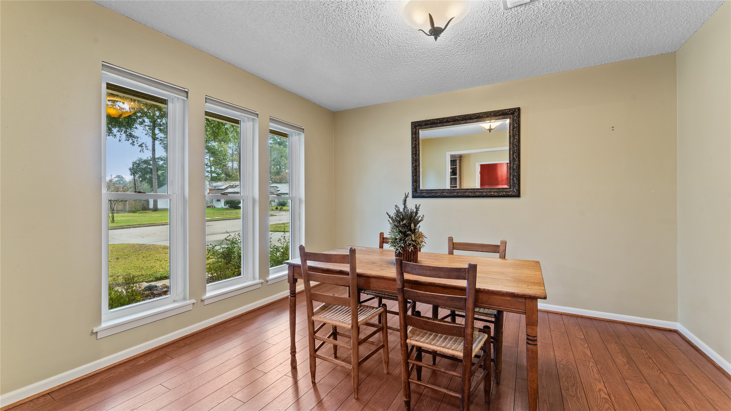 208 Magnolia Way Huntsville, TX 77320 - Photo 7 of 26 Hosting dinner, holiday parties or need a space to work...this room can serve in many ways.