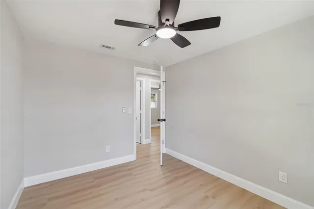 a view of an empty room and window