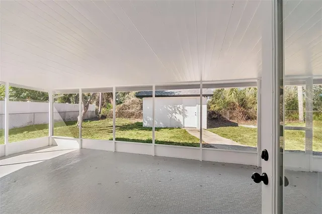 a view of a backyard of the house