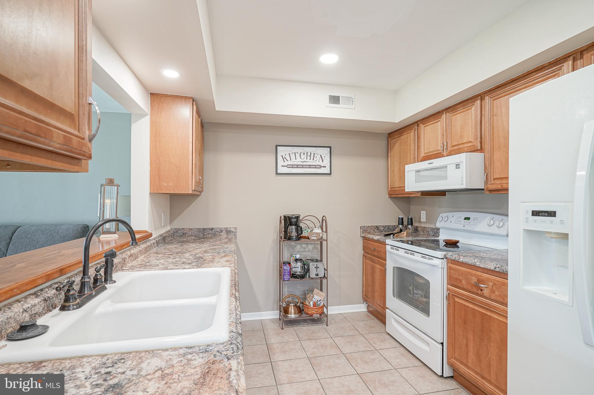 2305 Sandra Road Voorhees, NJ 08043 - Photo 11 of 24 a kitchen with a sink stove and cabinets