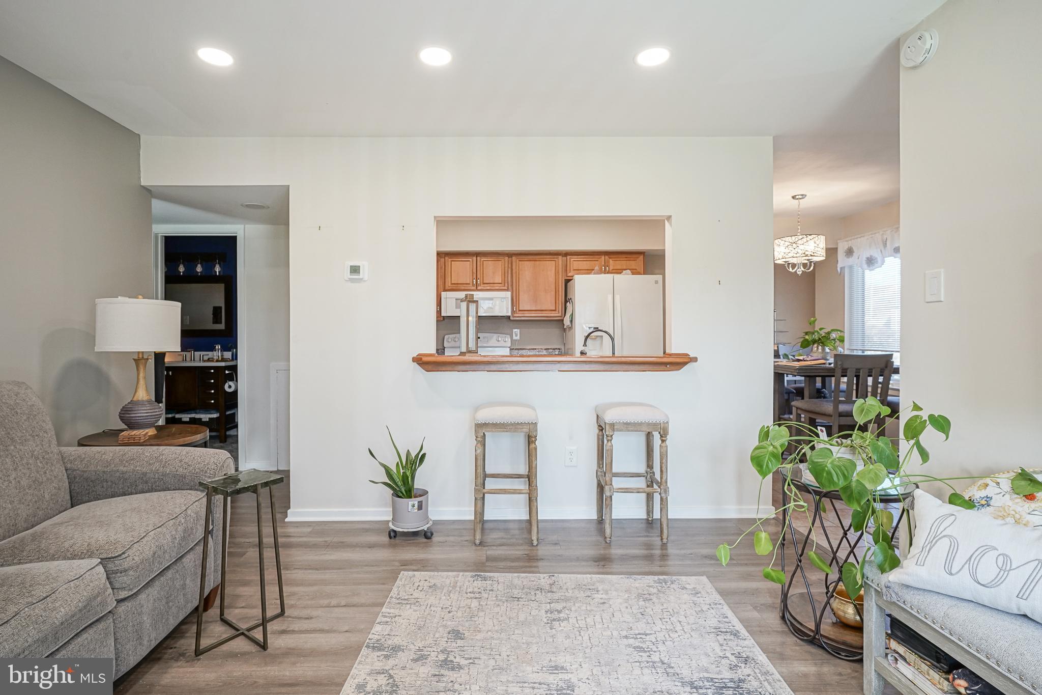 2305 Sandra Road Voorhees, NJ 08043 - Photo 6 of 24 a living room with furniture and a potted plant