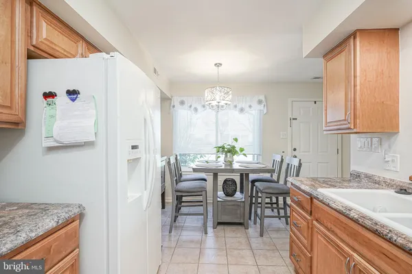 a view of a kitchen area with furniture and window