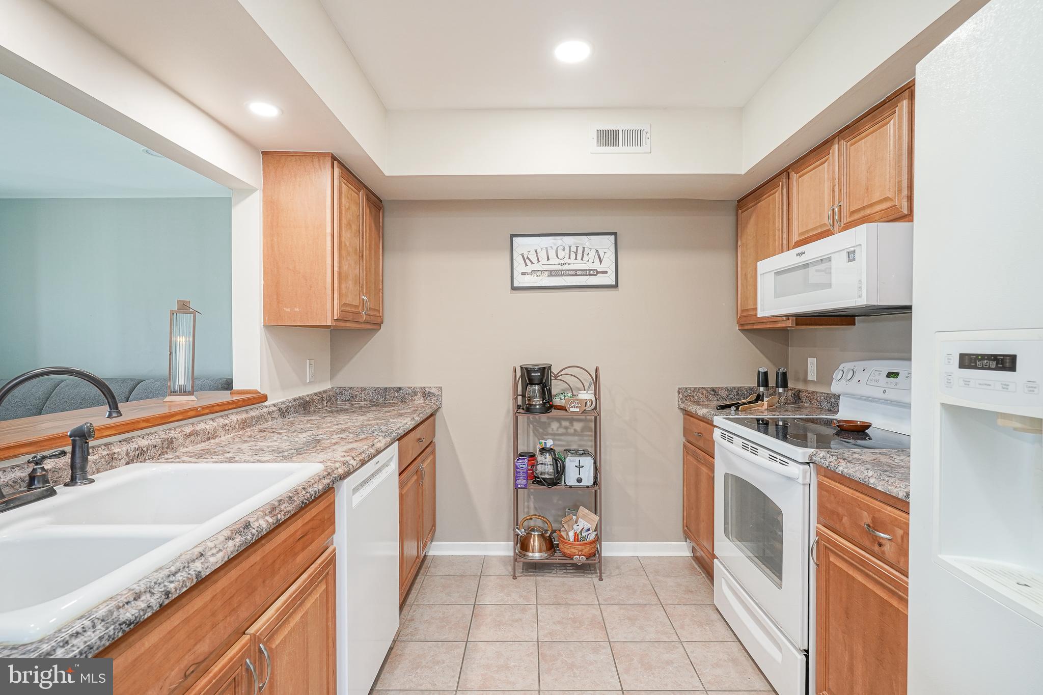 2305 Sandra Road Voorhees, NJ 08043 - Photo 10 of 24 a kitchen with a sink stove and cabinets