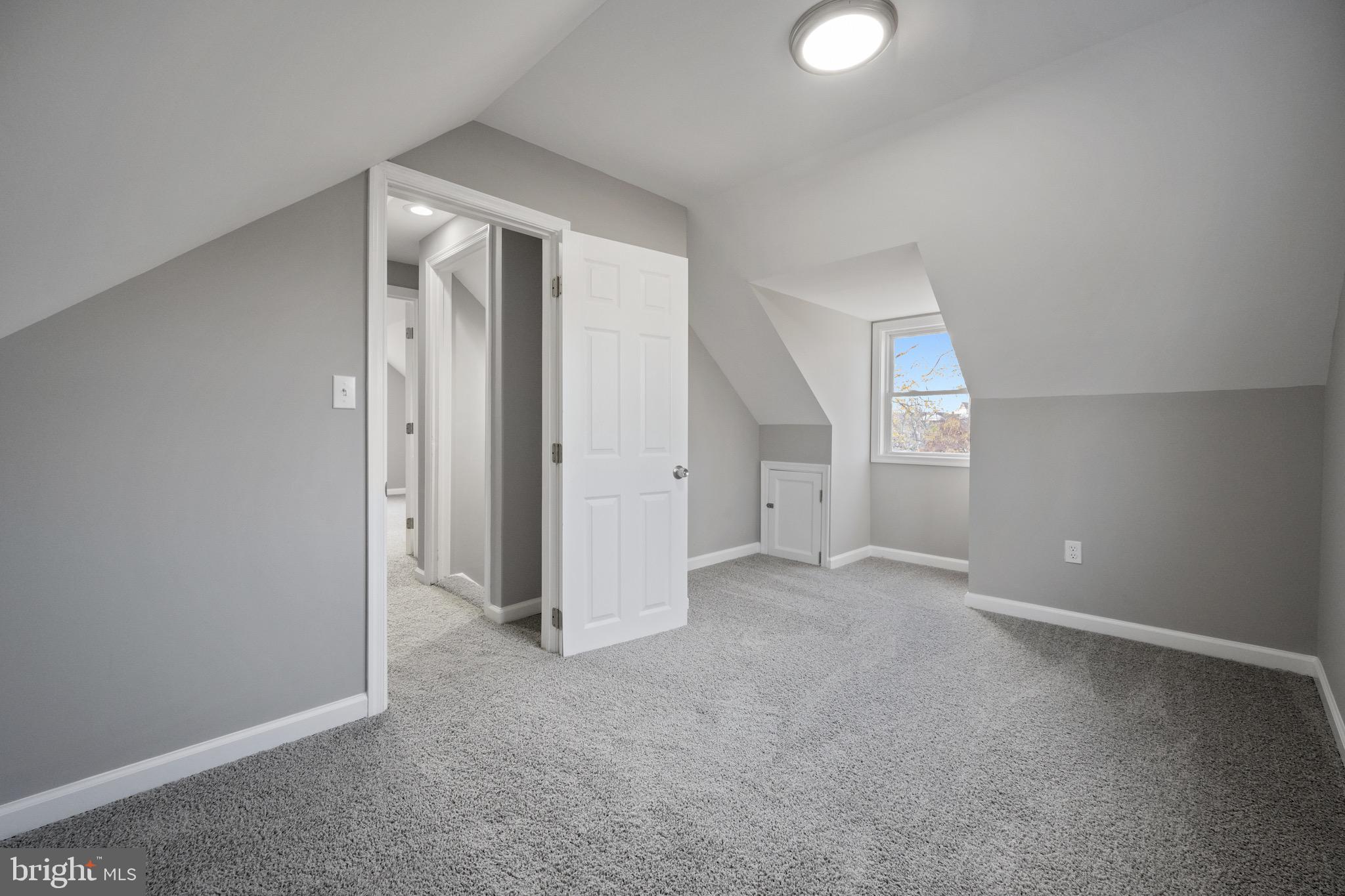 3401 Court Way Baltimore, MD 21222 - Photo 16 of 35 an empty room with windows and closet