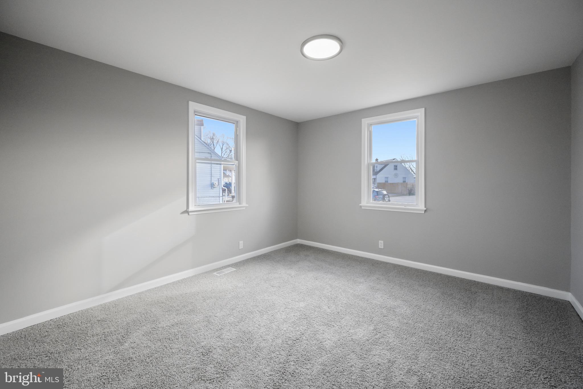 3401 Court Way Baltimore, MD 21222 - Photo 23 of 35 an empty room with windows