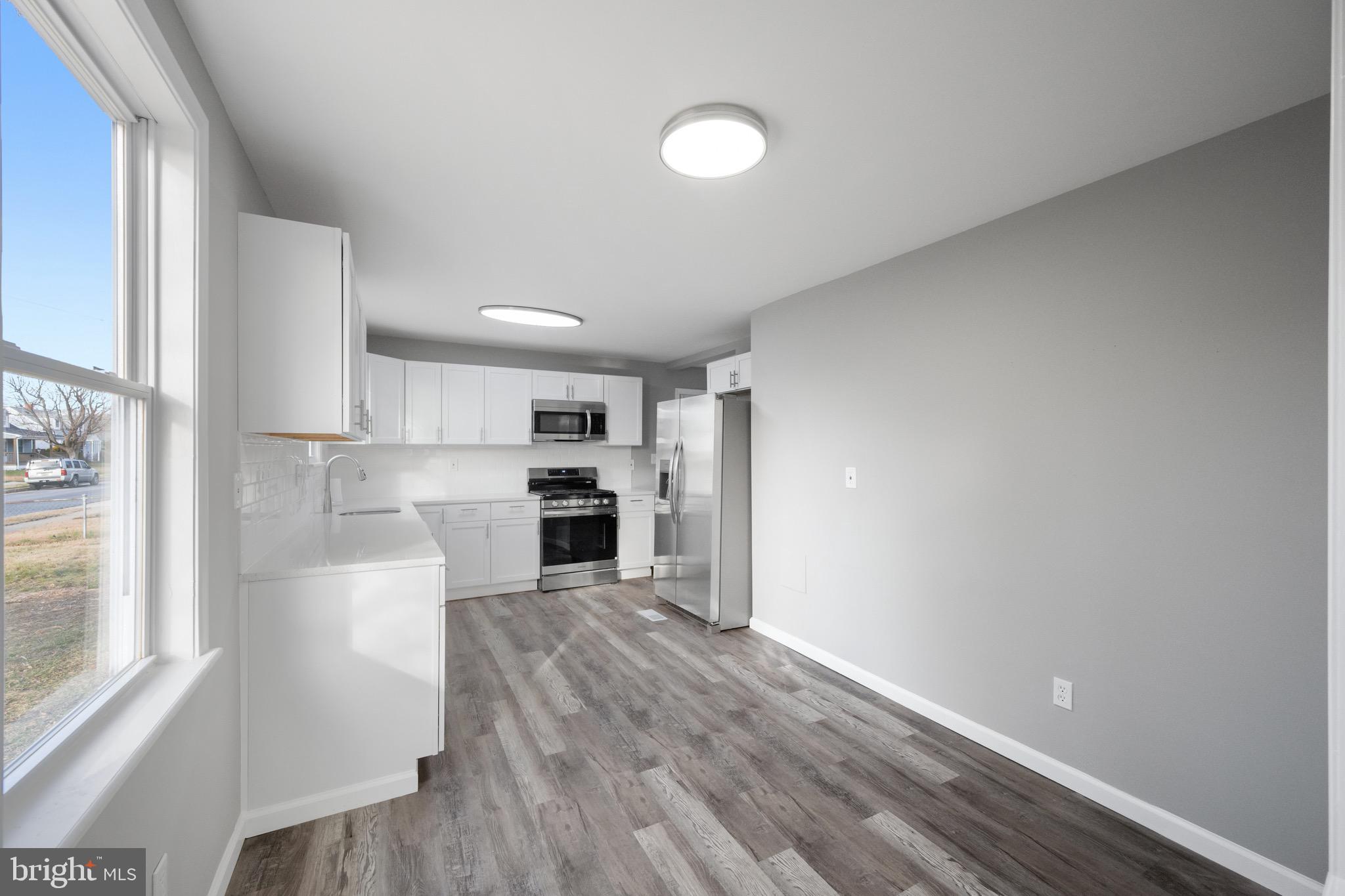 3401 Court Way Baltimore, MD 21222 - Photo 28 of 35 a view of kitchen with wooden floor