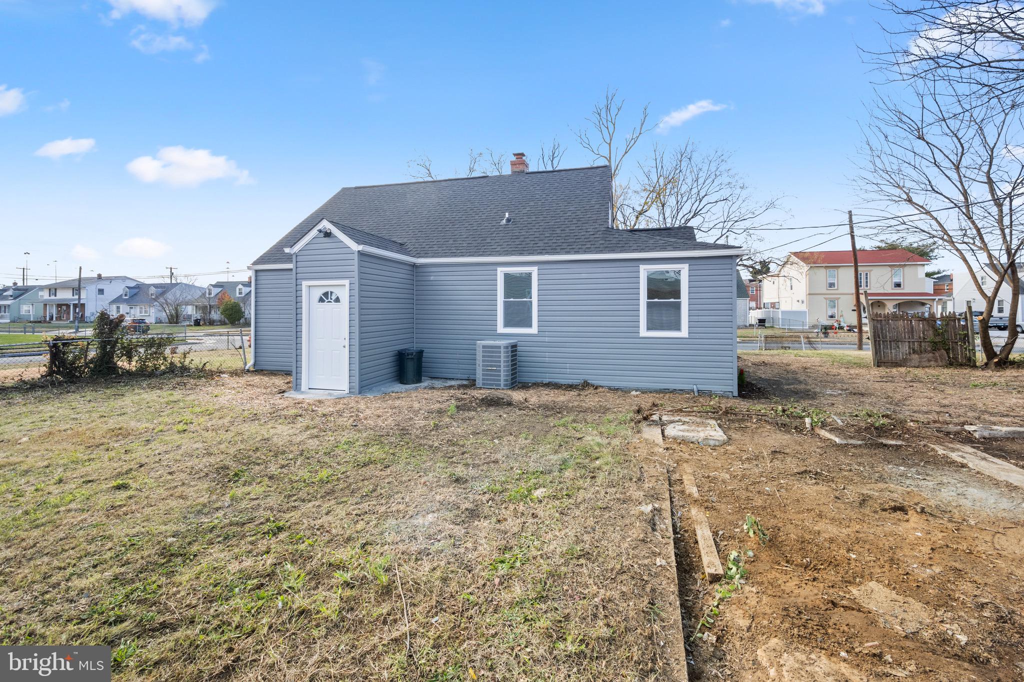 3401 Court Way Baltimore, MD 21222 - Photo 5 of 35 a view of a house with a yard