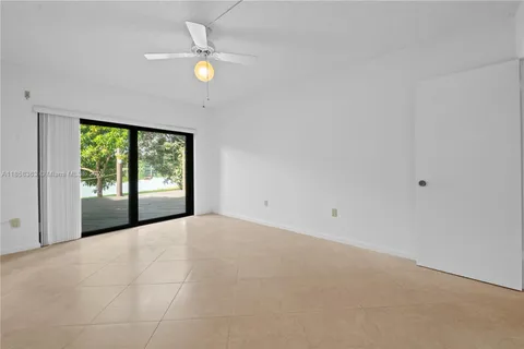a view of a backyard with wooden floor