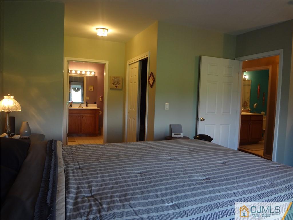 368 Rector Street, Unit 304 Perth Amboy, NJ 08861 - Photo 15 of 23 a large bedroom with wooden floor