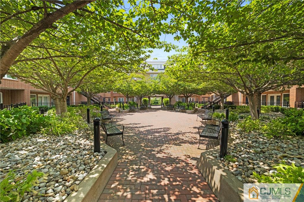 368 Rector Street, Unit 304 Perth Amboy, NJ 08861 - Photo 2 of 23 a view of house with trees in the background
