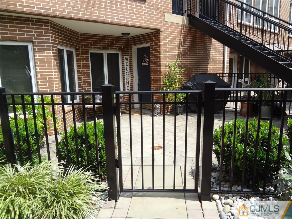 368 Rector Street, Unit 304 Perth Amboy, NJ 08861 - Photo 3 of 23 a view of a house with backyard and garden