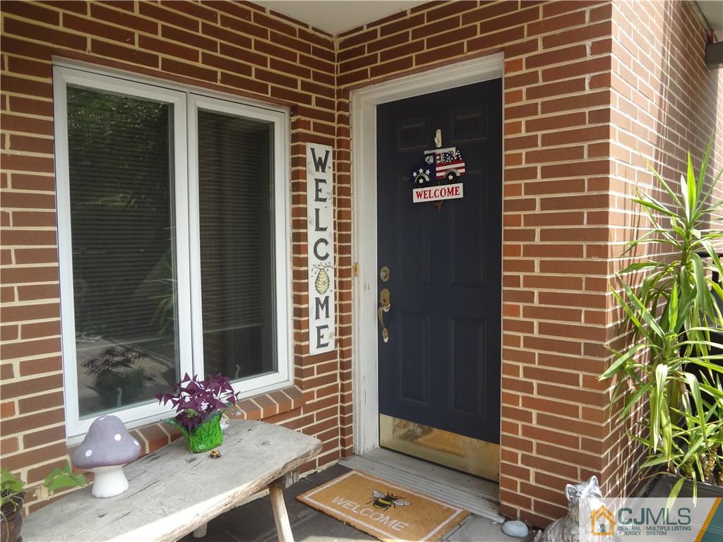 368 Rector Street, Unit 304 Perth Amboy, NJ 08861 - Photo 6 of 23 a front view of a house with outdoor space