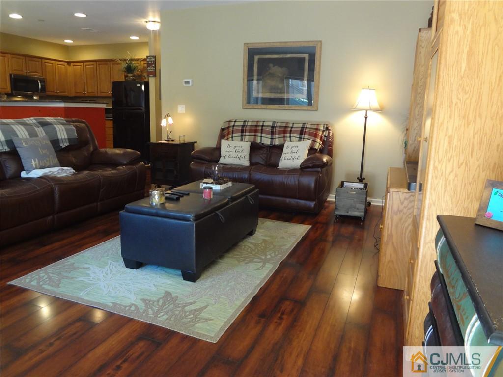 368 Rector Street, Unit 304 Perth Amboy, NJ 08861 - Photo 7 of 23 a living room with furniture and wooden floor