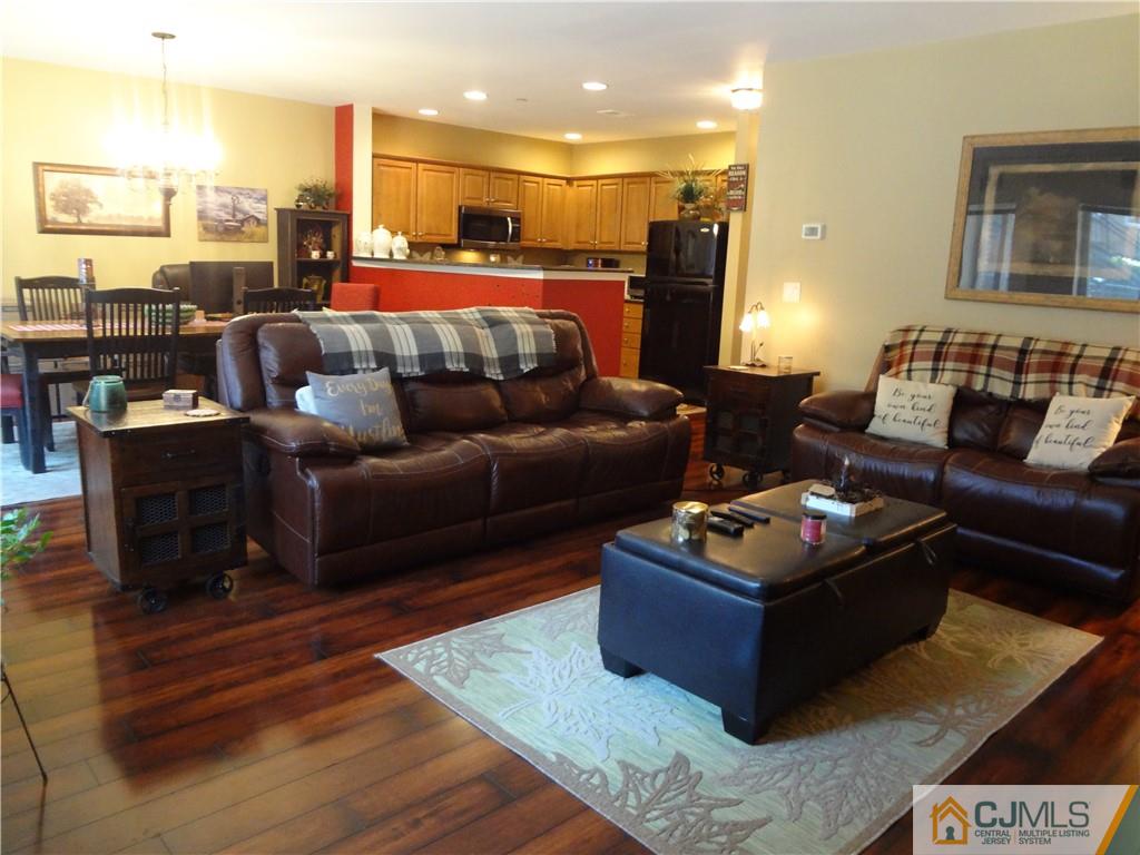 368 Rector Street, Unit 304 Perth Amboy, NJ 08861 - Photo 8 of 23 a living room with furniture and a couch
