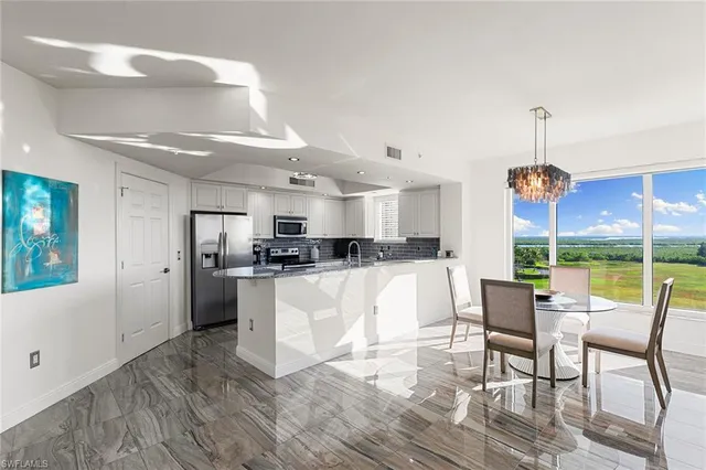 a view of balcony with furniture