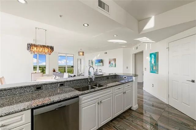 a bathroom with a sink double vanity and a bathtub