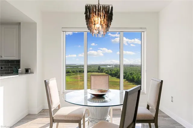a bathroom with a double vanity sink mirror and toilet