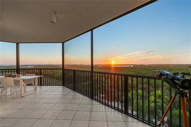 a view of storage and utility room with washer and dryer