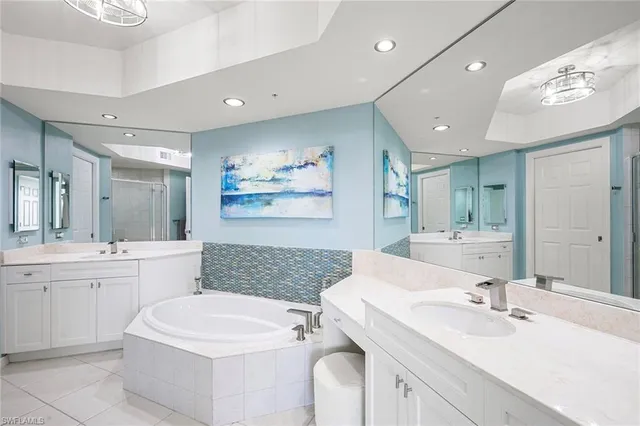 a view of a swimming pool with a lounge chairs