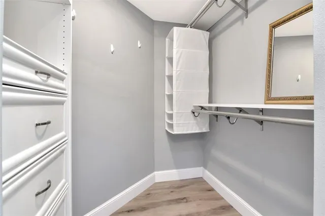 an empty room with large sliding door