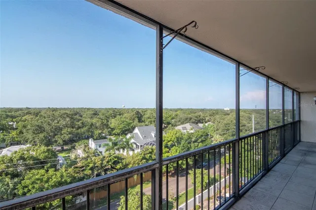 a view of swimming pool with outdoor seating and yard