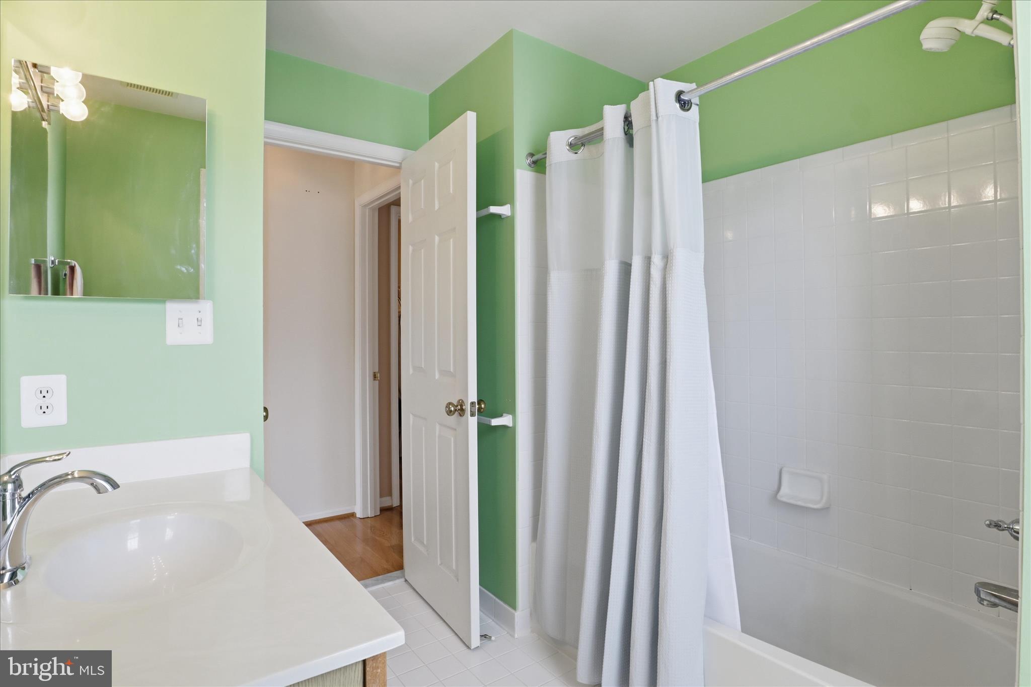 25352 Ripleys Field Drive Chantilly, VA 20152 - Photo 24 of 54 a bathroom with a sink a toilet and shower
