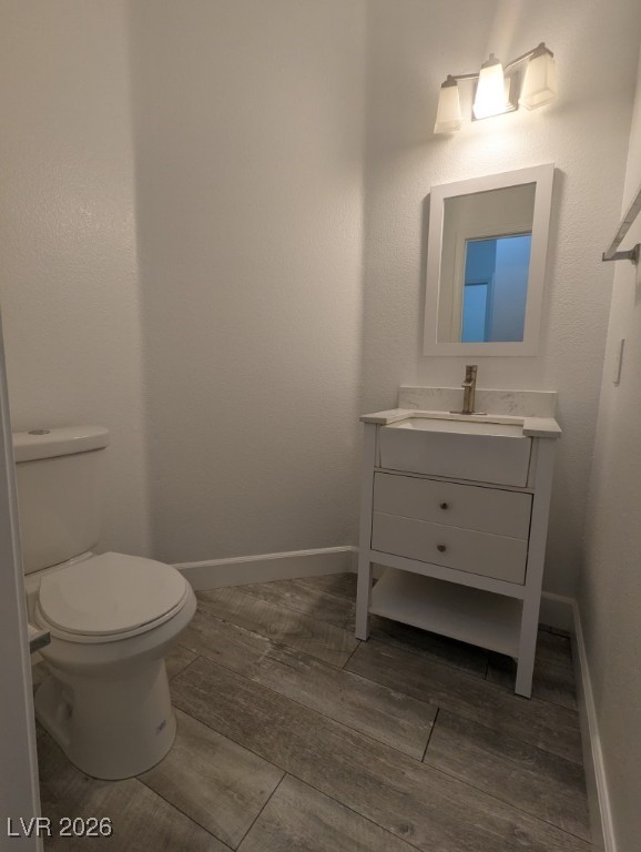 9303 Gilcrease Avenue, Unit 1137 Las Vegas, NV 89149 - Photo 11 of 30 Bathroom with vanity and a textured wall