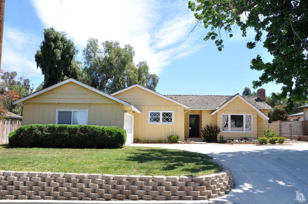 1072 Appleton Road Simi Valley, CA 93065 - Photo 1 of 41 a front view of a house with a garden