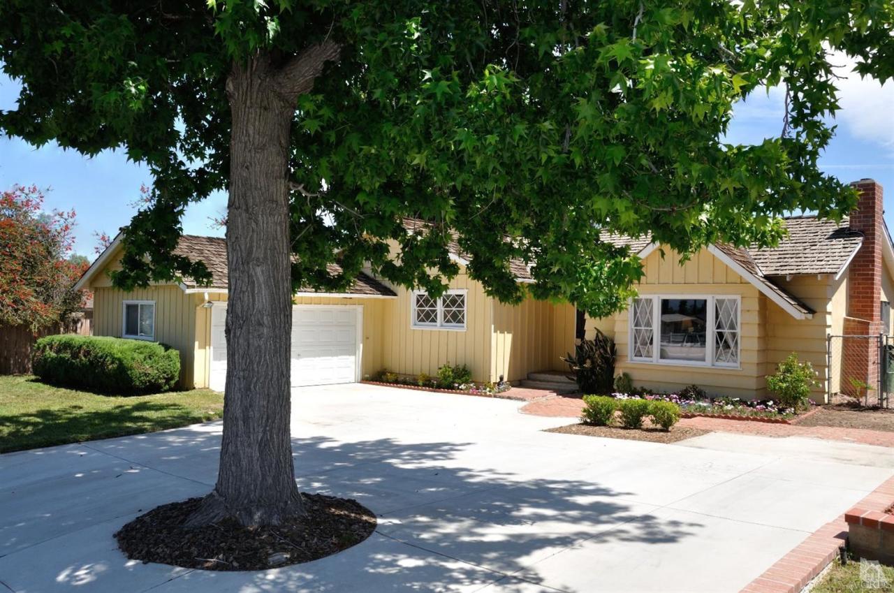 1072 Appleton Road Simi Valley, CA 93065 - Photo 2 of 41 a front view of a house with yard patio and green space