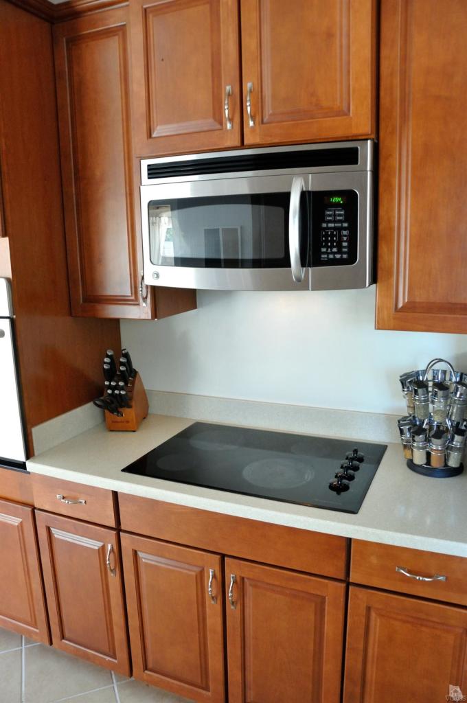1072 Appleton Road Simi Valley, CA 93065 - Photo 14 of 41 a kitchen with a sink and cabinets