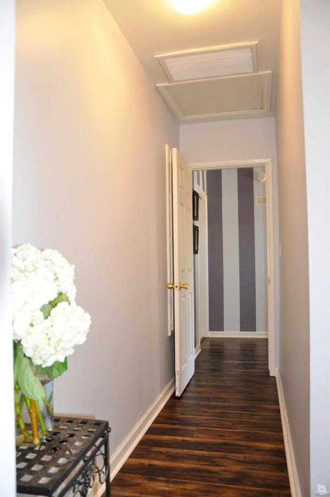 1072 Appleton Road Simi Valley, CA 93065 - Photo 17 of 41 a view of a hallway with wooden floor