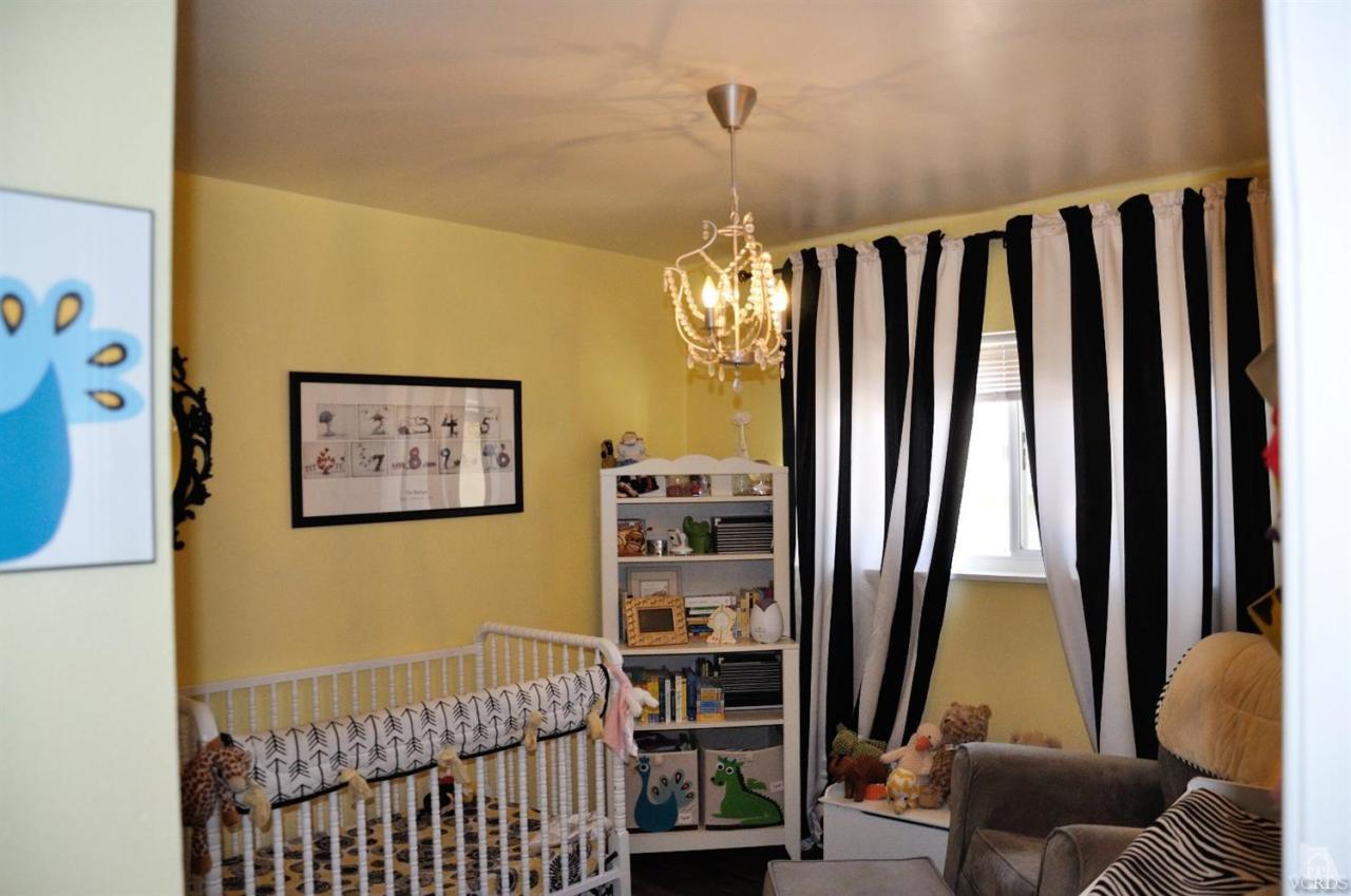 1072 Appleton Road Simi Valley, CA 93065 - Photo 23 of 41 a bedroom with furniture and a window