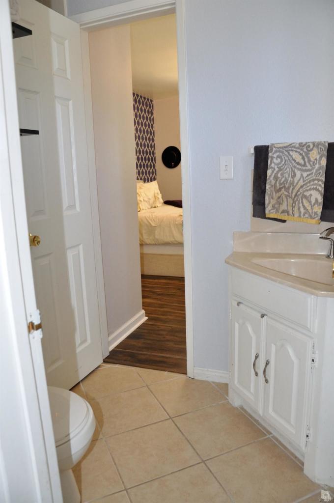 1072 Appleton Road Simi Valley, CA 93065 - Photo 26 of 41 a bathroom with a sink a toilet and shower