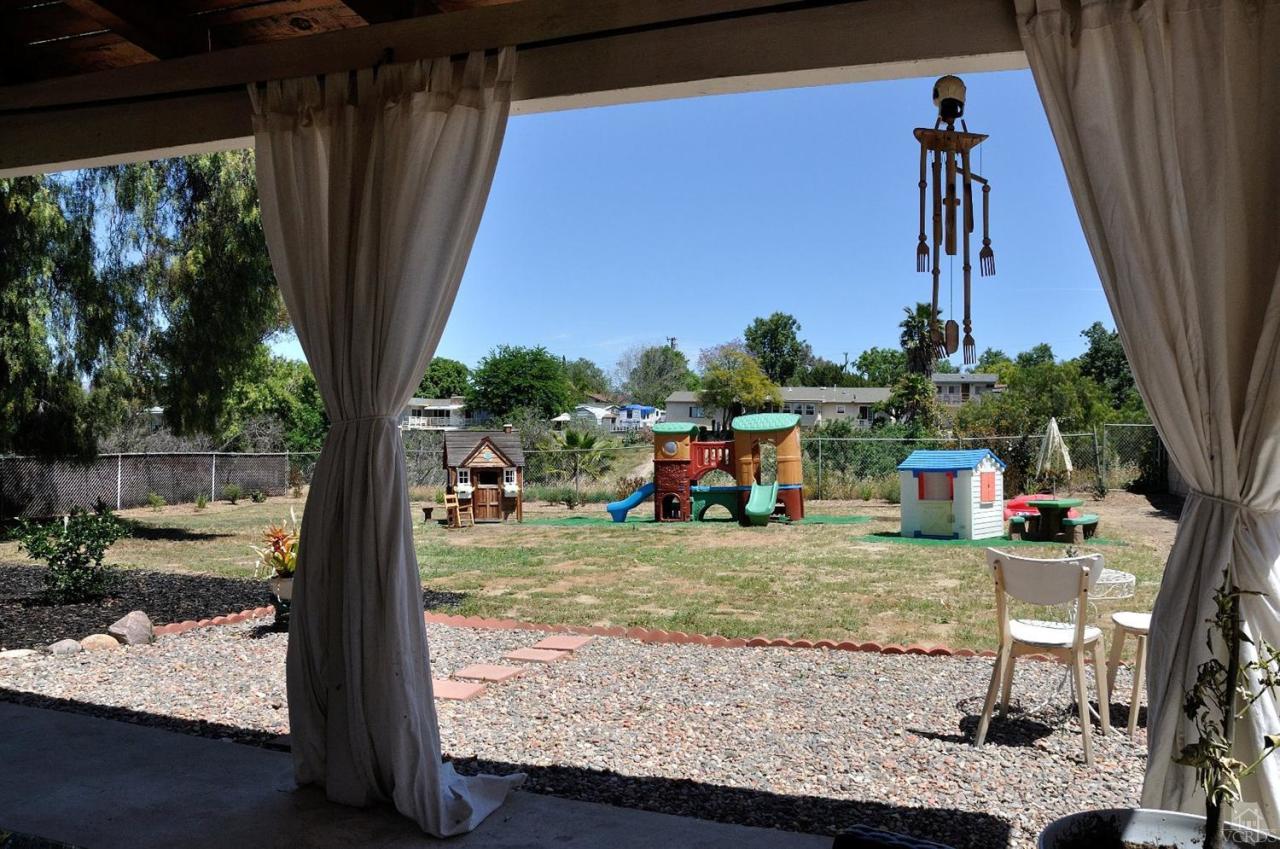 1072 Appleton Road Simi Valley, CA 93065 - Photo 35 of 41 a view of a porch with furniture and a yard